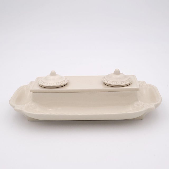 A creamware inkwell, England circa 1880.