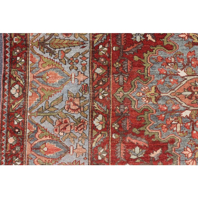 Antique Persian Bakhtiari Rug With Red Field and Blue Medallion Design For Sale - Image 9 of 16