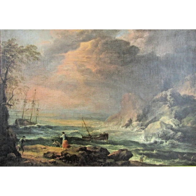An oil on canvas depicting a seascape with figures ona rocky shore and ships in a turbulent sea. This is an original 1773...