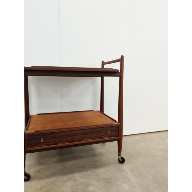 Authentic vintage mid century modern teak trolley / serving cart / bar cart. By White and Newton of Portsmouth. Maker's...