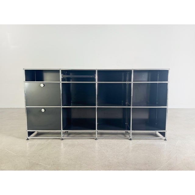 We are offering a beautiful black USM Haller shelving unit/sideboard for sale. The unit is four modular units high and...