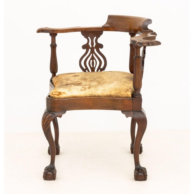 Chippendale Style Mahogany Corner Chair, atop ball and claw feet. 33" H x 35" W x 26" D; seat: 19" H. Provenance: From a...
