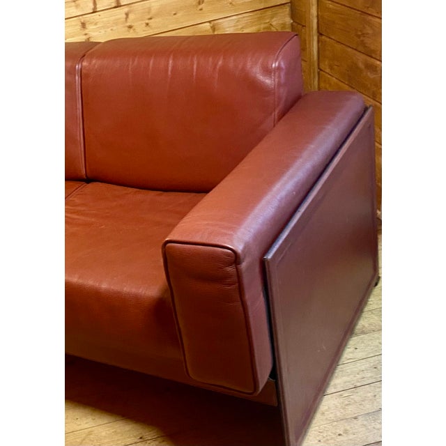 Iconic Korium KM 3/1 two-seater sofa, designed by renowned Italian designer Tito Agnoli for Matteo Grassi. This emblematic...