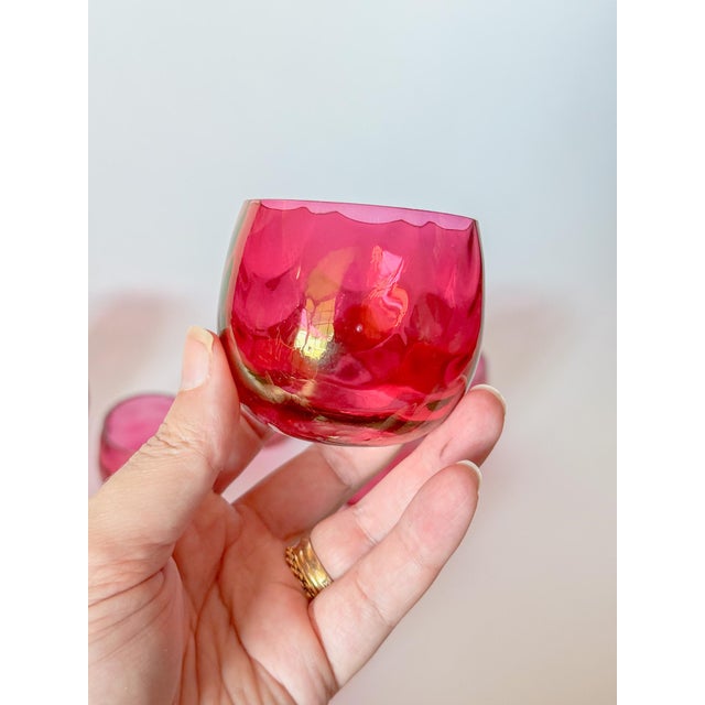 Absolutely beautiful set of twelve Mid Century West Virginia Glass Deep Rose pink cranberry optic roly poly glasses. These...