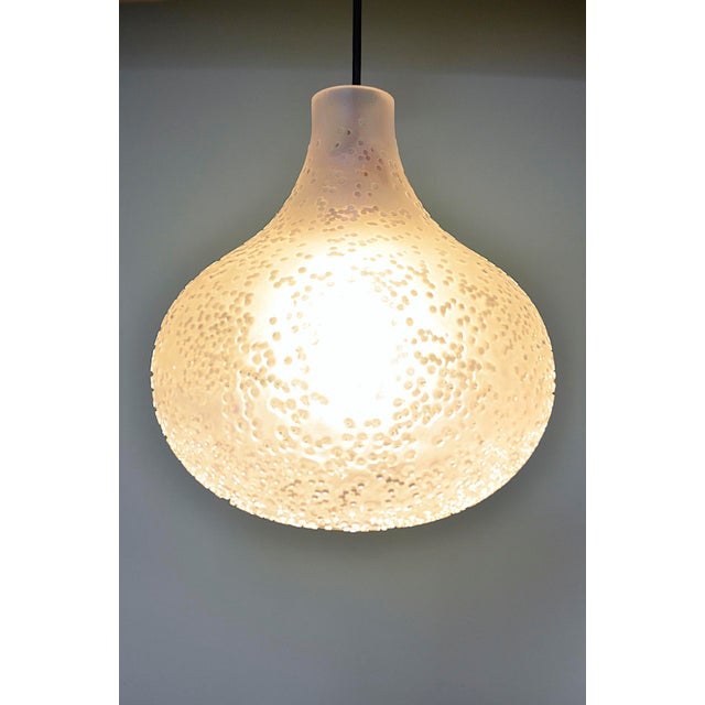 Beautiful crystal glass tulip pendant lamp by the german designer horst tünselmann for peill & putzler from the 1960s. The...