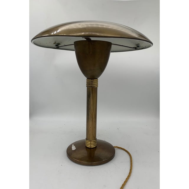 Table lamp in good condition, with redone wiring. The Sciolari brand is marked inside (in the cast iron) and outside with...