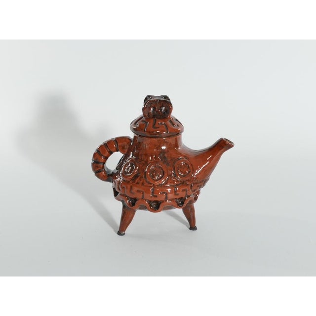 This playful and unique teapot, has different sides to it. Sometimes it looks like just a quirky tea pot with a bright...