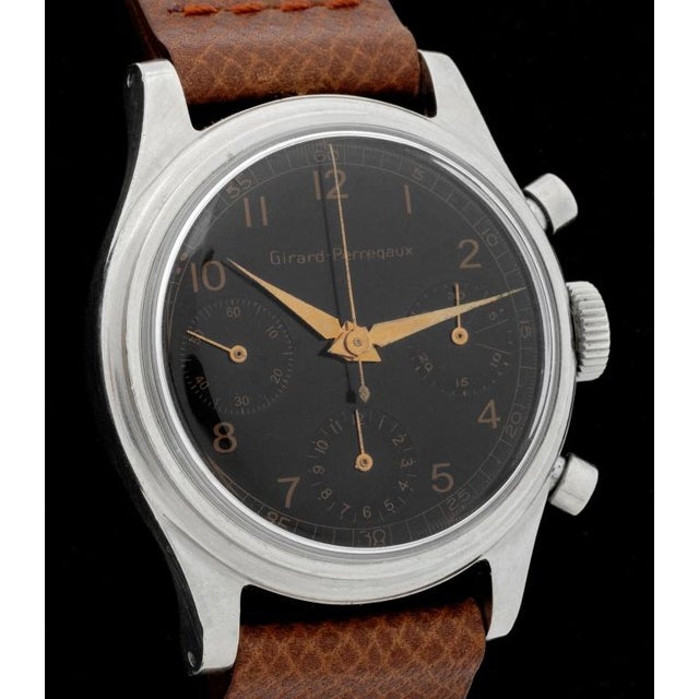 Girard Perregaux Steel Chronograph Valjoux 72, with black dial, with rose gold, hands, marked, and Arabic numeral indexes,...