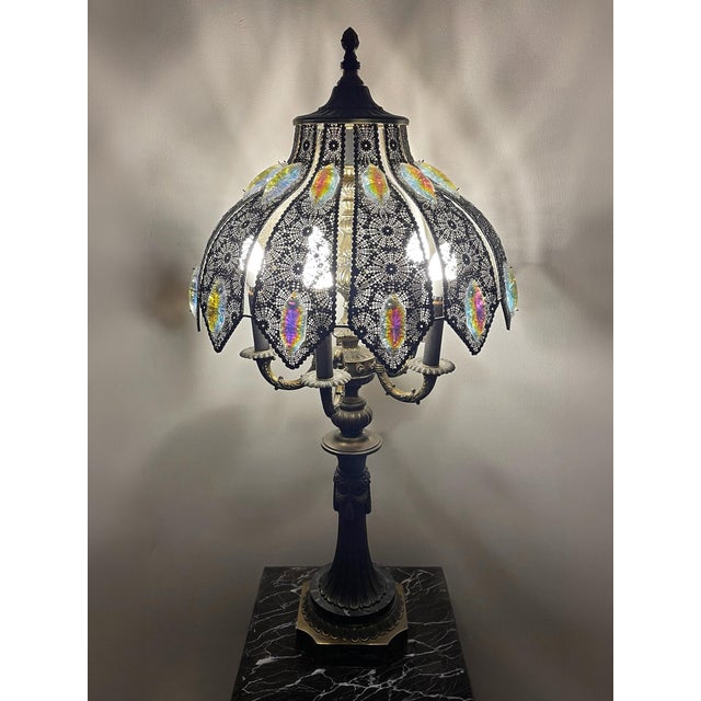 A striking and highly sculptural monumental vintage table lamp, this piece captures the opulence of Hollywood Regency...