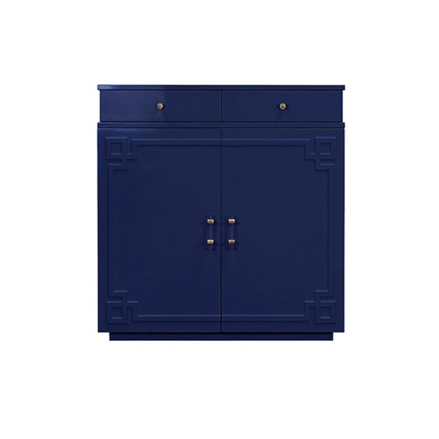 New special order item. Not vintage. The Glenn cabinet brings sophisticated storage to any room with its striking navy...