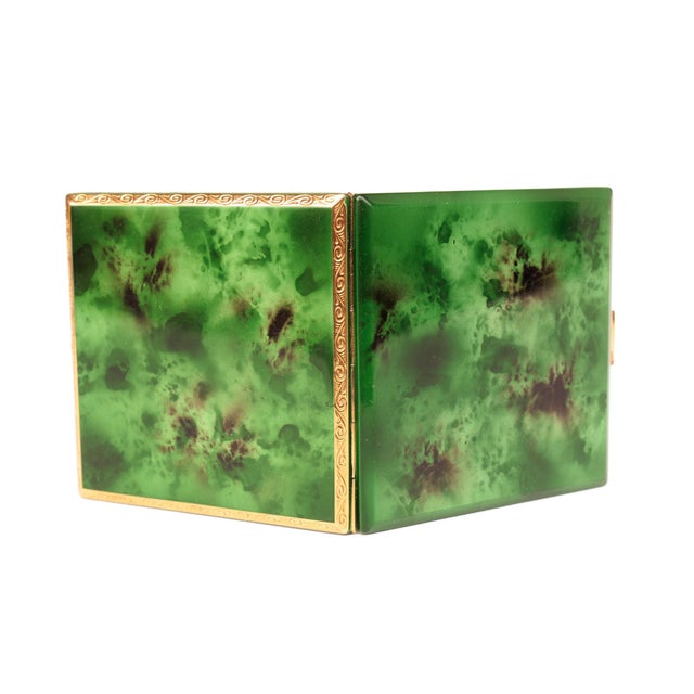 Elegant Art Deco powder compact, made in Germany in the 1930s. Brass, tombac, and white metal. Tortoiseshell-effect...