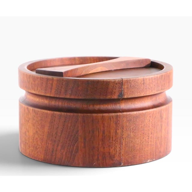 Mid Century Danish Modern teak ice bucket, with original plastic liner. This example is in good, original, clean and ready...