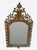 19th century antique Napoleon III style wall mirror featuring embossed bronze or brass workmanship and a crowned head on...