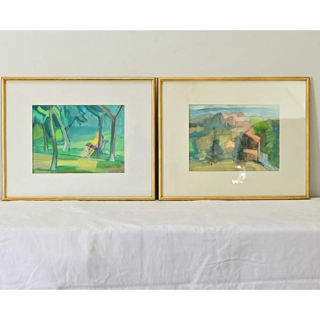 Dimensions: 16 ½” H x 20 ¼” W x ⅝” D A pair of vintage French watercolor paintings by Roger Caillete, one figurative and...