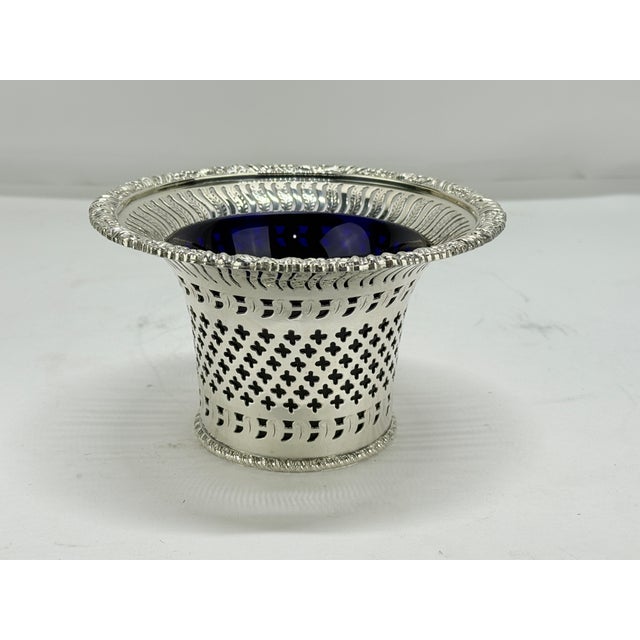 This English silverplate openwork vessel, marked for Barker Ellis of Birmingham, displays the firm’s characteristic...