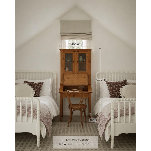 Charming two-piece, pine desk + hutch with Shaker proportions. Natural, oiled finish with simple brass hardware and two...