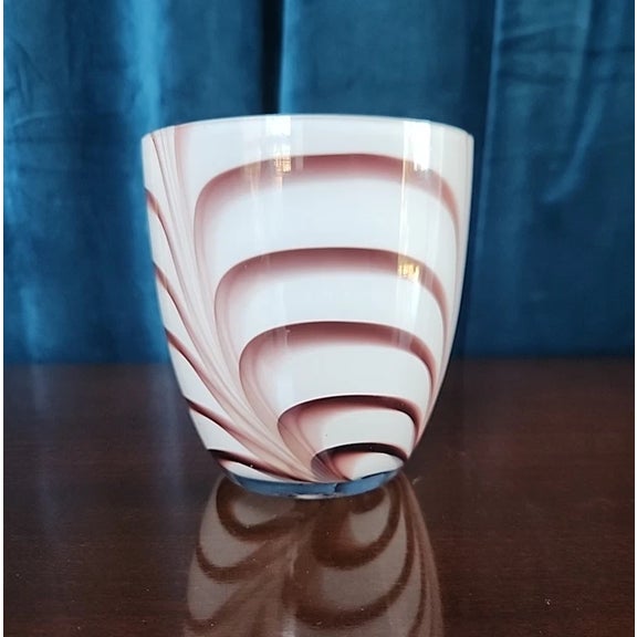 Add timeless elegance to your space with this stunning vintage Murano-style art glass vase. Expertly crafted in the...