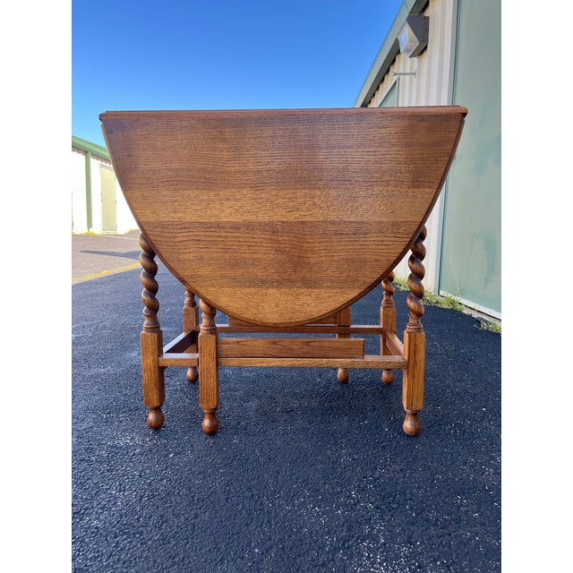 Early 1900's English Oak Barley Twist Oval Gate Leg Table For Sale - Image 4 of 12
