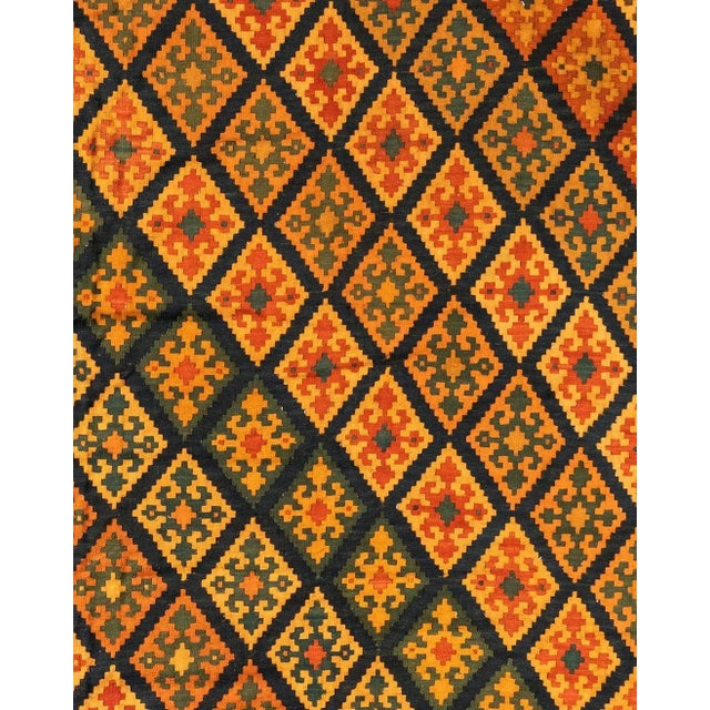 Kilim, a word of Turkish origin, denotes a pileless textile of many uses produced by one of several flat-weaving...