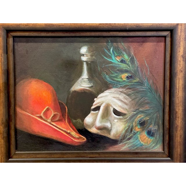 Overview: Up for sale is an incredible still life oil painting on stretched canvas depicting a theater mask, a Robin-Hood...