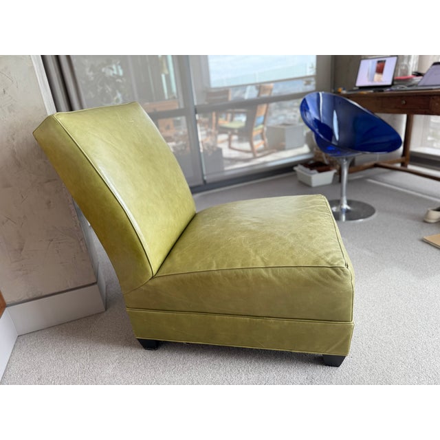 Elevate your space with this sophisticated lounge chair from Mitchell Gold + Bob Williams, a brand celebrated for its...