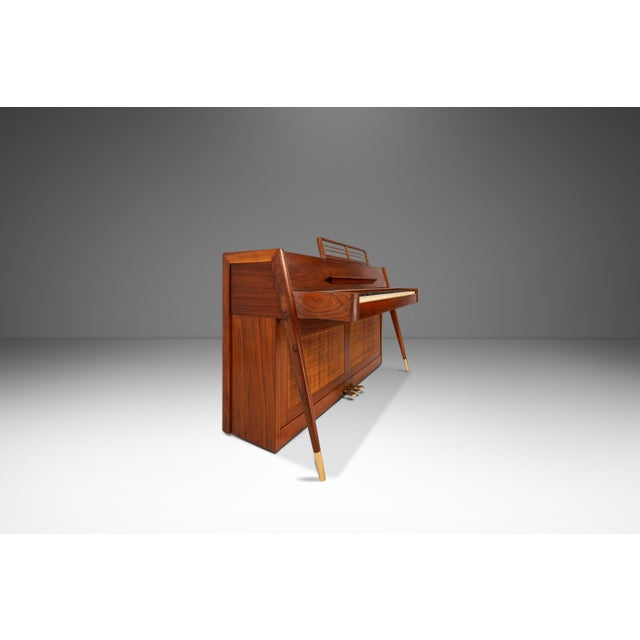 This iconic Mid-Century Modern Baldwin Acrosonic spinet piano is the highly sought-after “Danish” model, celebrated for...