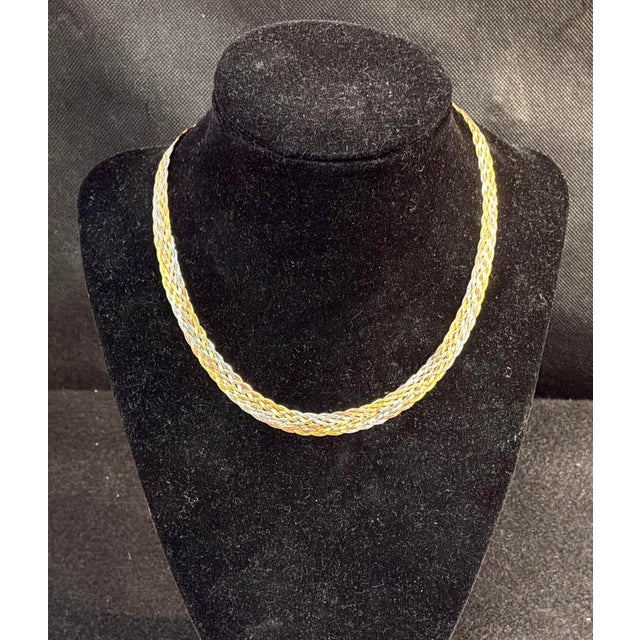 Vintage 14K Yellow, White, and Rose Gold Woven Necklace. Necklace features an intricate woven design that creates a rich...