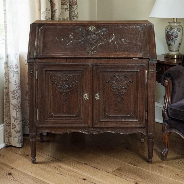 19th Century Liègeoise Louis XVI Style Solid Oak Secrétaire reflects the refined cabinetmaking tradition of the French-...