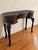 A striking vintage console table that celebrates craftsmanship, texture, and sculptural form. Featuring an elongated,...