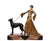This impressive Art Deco sculpture, crafted by Georges Gori in 1920, portrays a woman elegantly walking her massive dog....