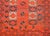 A gorgeous early 20th century Persian Ersari rug with an all-over stylized floral pattered woven in crimson, white, and...