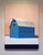 "Barn, Palette #5" is an acrylic on canvas landscape painting by Justin Wheatley, completed in 2024. A blue barn stands...