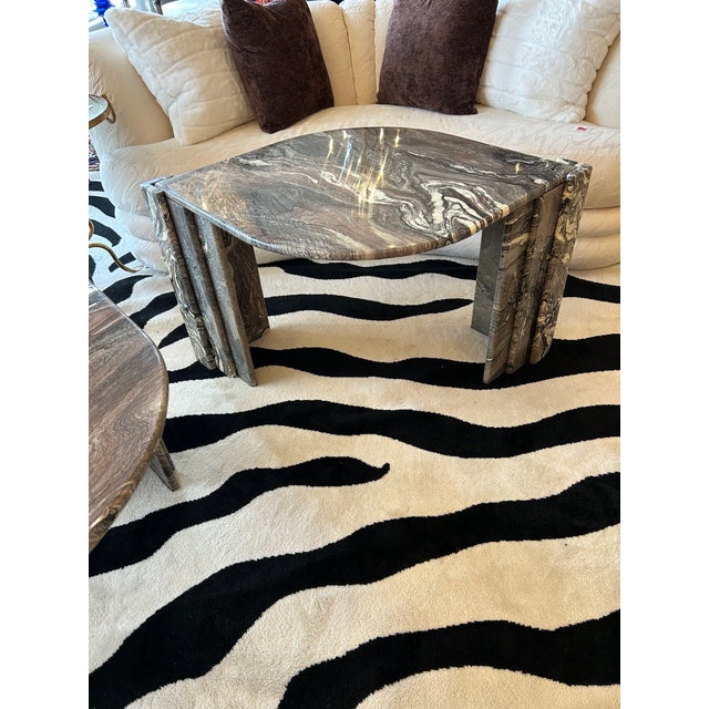Glamorous Cipollino marble pair of “Eye” end table or cocktail table attributed to Roche Bobois. Capturing the bold...