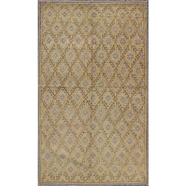 Vintage Turkish Oushak Rug With Lattice Blossom Design in Camel and Lavender 4′10″ × 8′5″ For Sale