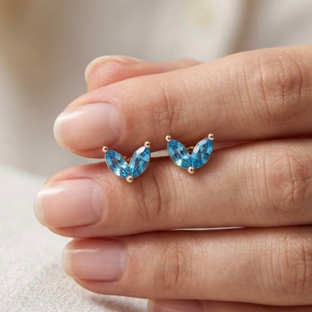Dainty Blue Topaz Leaf Earrings | v-Shape Marquise Cut Gemstone Studs | Minimalist December Birthstone Studs - A Pair For Sale - Image 4 of 4