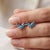 Dainty Blue Topaz Leaf Earrings | v-Shape Marquise Cut Gemstone Studs | Minimalist December Birthstone Studs - A Pair For Sale - Image 4 of 4