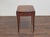 This English mahogany Pembroke table from the 19th century is a refined example of functional elegance. The top is crafted...