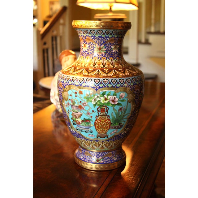 This vase is absolutely gorgeous in person! It is exceptionally large for cloisonne standing at 17.75". It was crafted by...