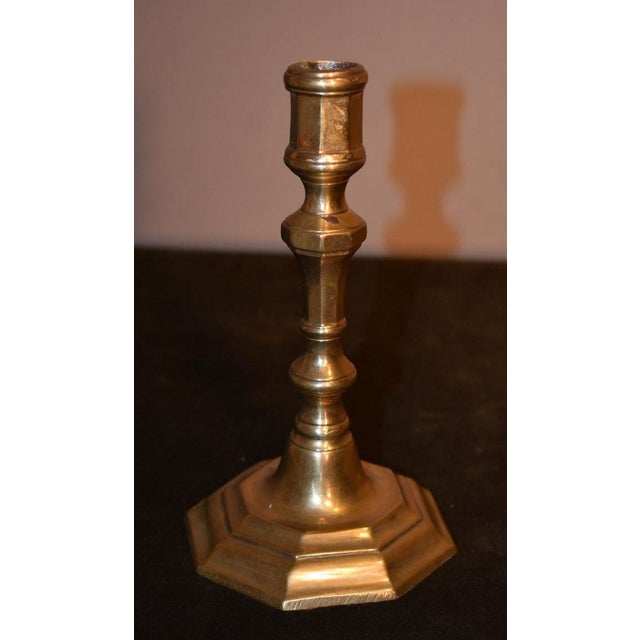 Smaller French bronze Candlestick circa 1720 with baluster form above a stepped octagonal base. These were generally...