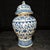 Stately matching pair of Chinese blue and white general’s ginger jars with domed fitted lids and decorative finials. The...