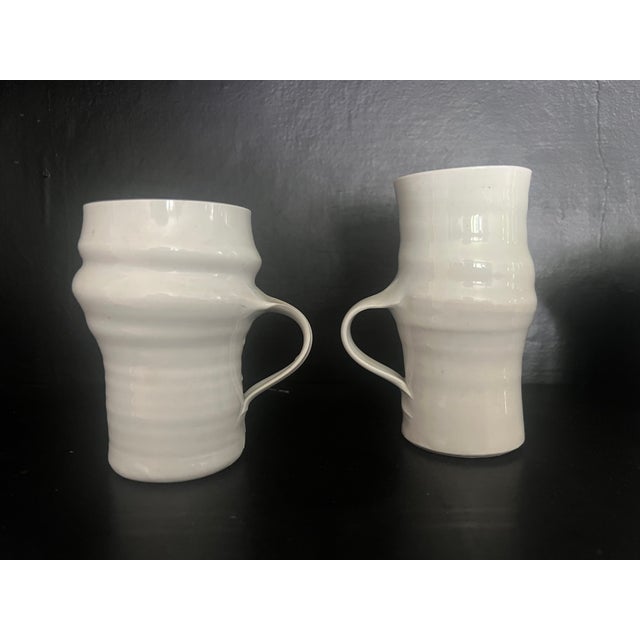 An exceptional, curated 5-piece collection of wheel-thrown studio art porcelain by the highly collected American...