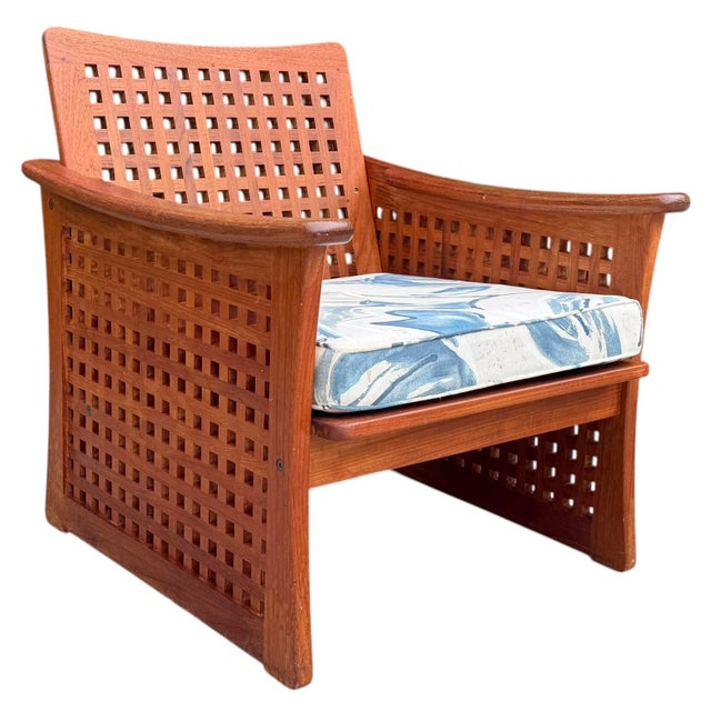 Striking vintage Kircodan teak lounge chair with an architectural lattice back and sides. The solid teak frame features...