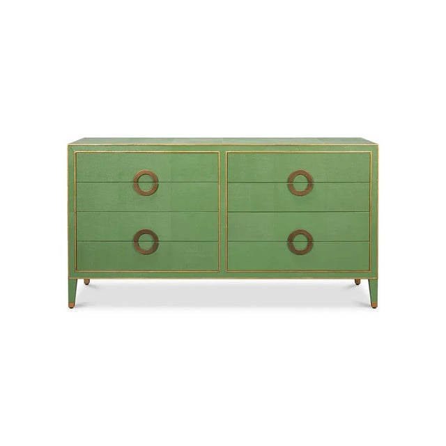 This exquisite piece features a rich green embossed leather, which exudes an air of sophistication and luxury. The dresser...