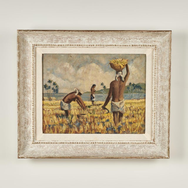 Transporting pair of oil paintings on board, one of women washing clothes and one of workers in a field, both in tropical...