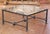 Anchor a large seating area with this impressive square wrought iron and glass coffee table, crafted circa 1970. The...