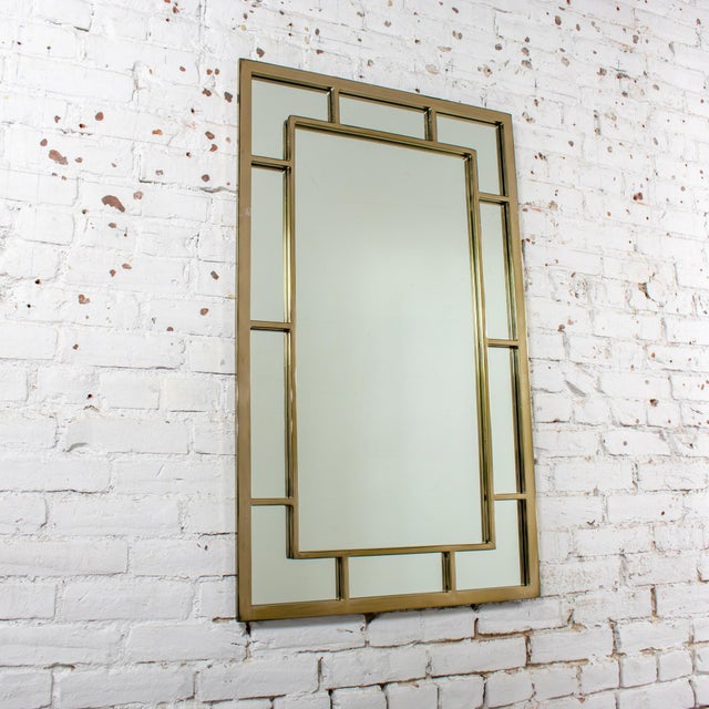 Marvelous vintage Modern large rectangular wall mirror with brass windowpane frame. Beautiful condition, keeping in mind...