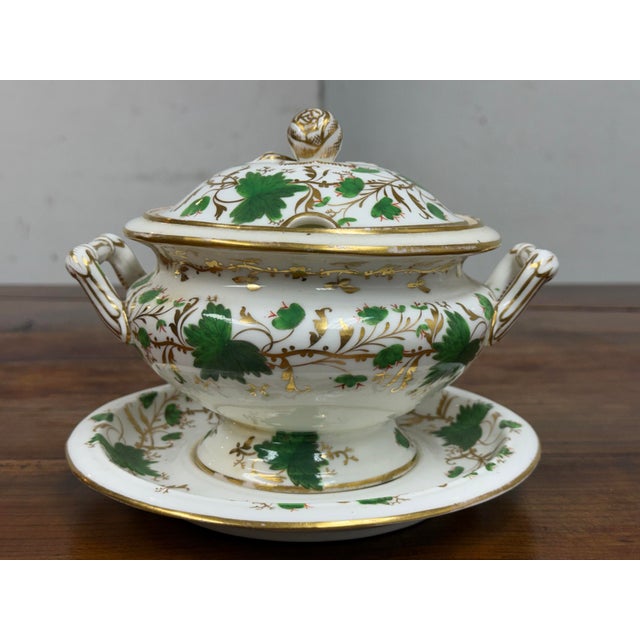 Design Plus Gallery presents a 19th Century English Ironstone Sauce Tureen with Lid and Plate to Rest. The ceramic is...