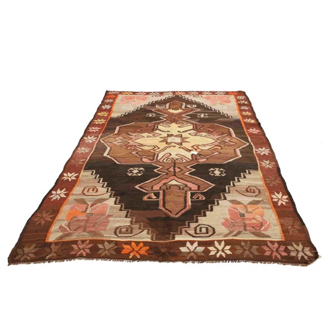 Vintage handwoven decorative kilim rug from Kars region of Tukey. Approximately 50-60 years old. In very good condition.