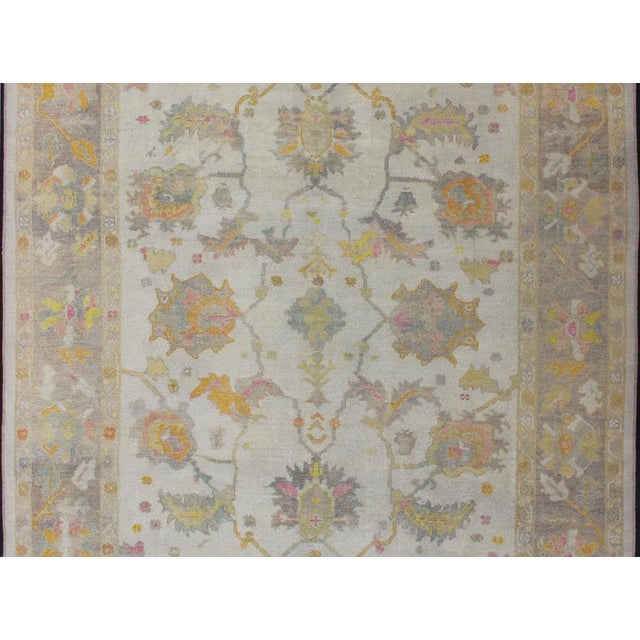 Turkish Oushak Rug With Muted Color Palette and All-Over Flower Design For Sale - Image 4 of 12