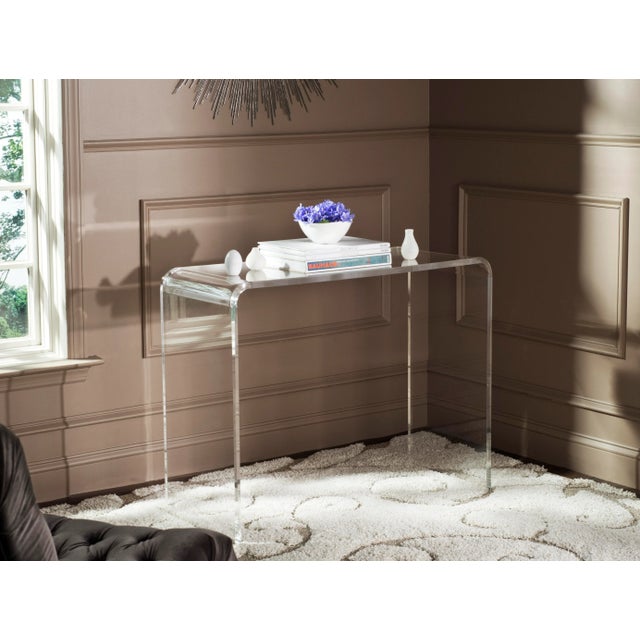 Create a stunning entry hall tableau with the Sixties-inspired see-through acrylic console. With soft-rounded edges,...